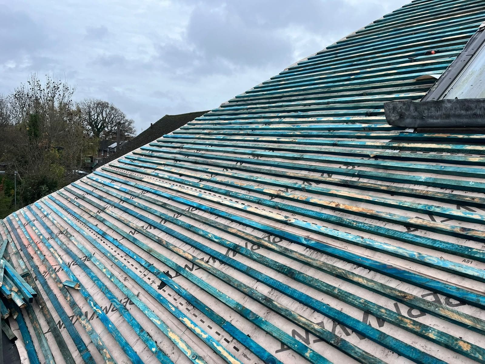Old battens exposed during a strip out