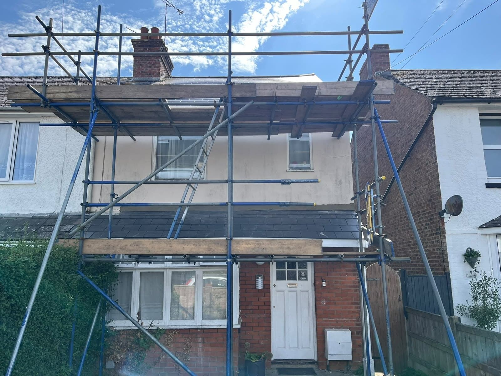 Full scaffold up on a semi detached re roof