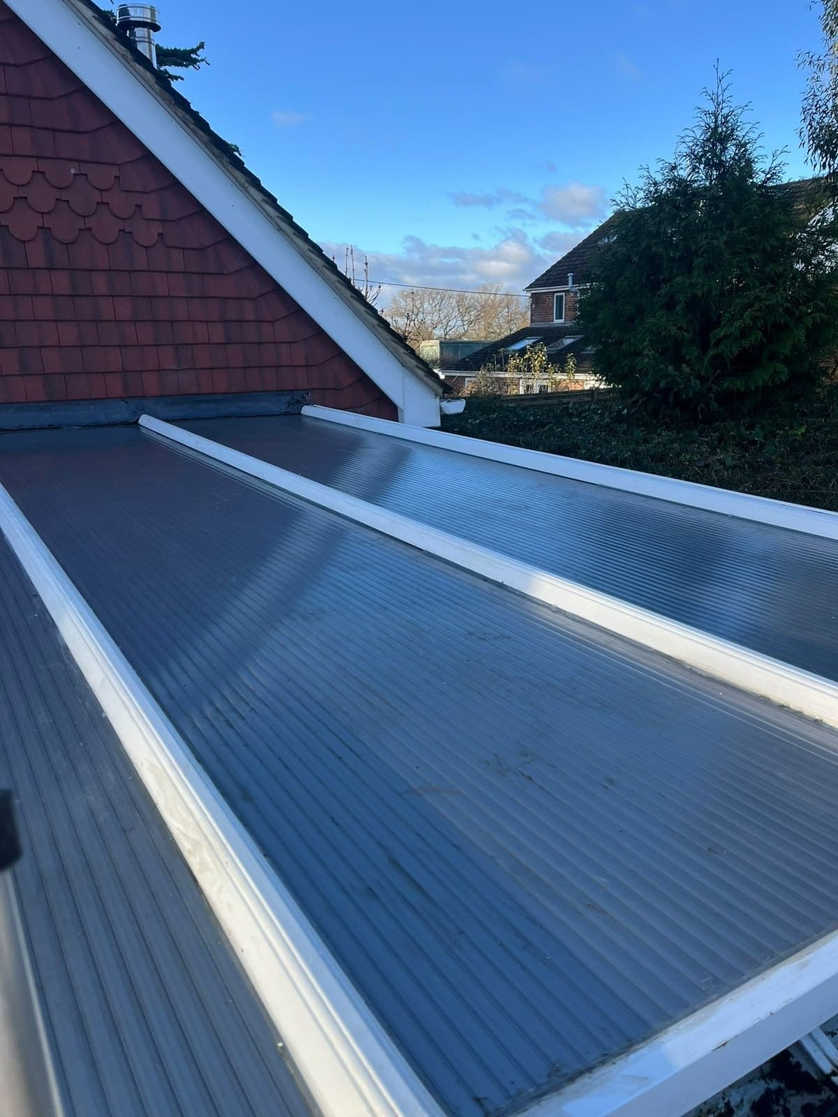 Replacement lean to roof with a new edge trim