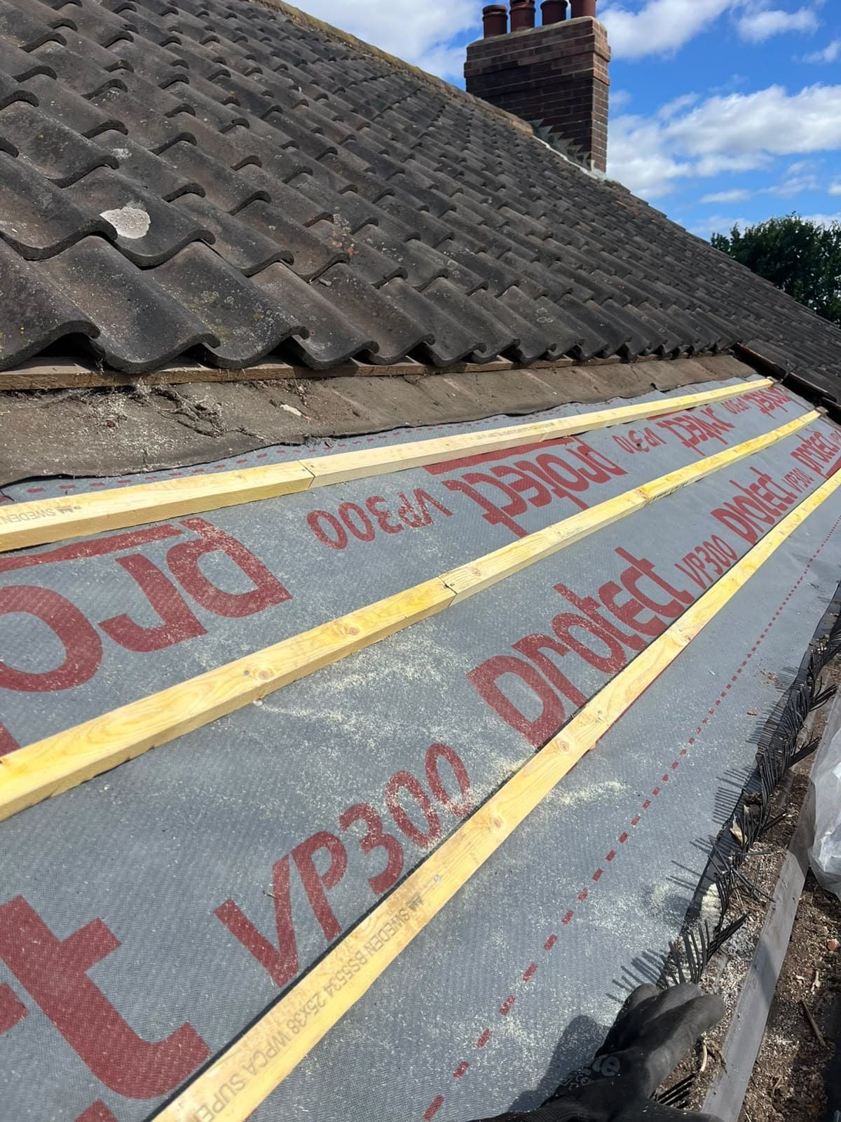 Breathable membrane and new battens going on