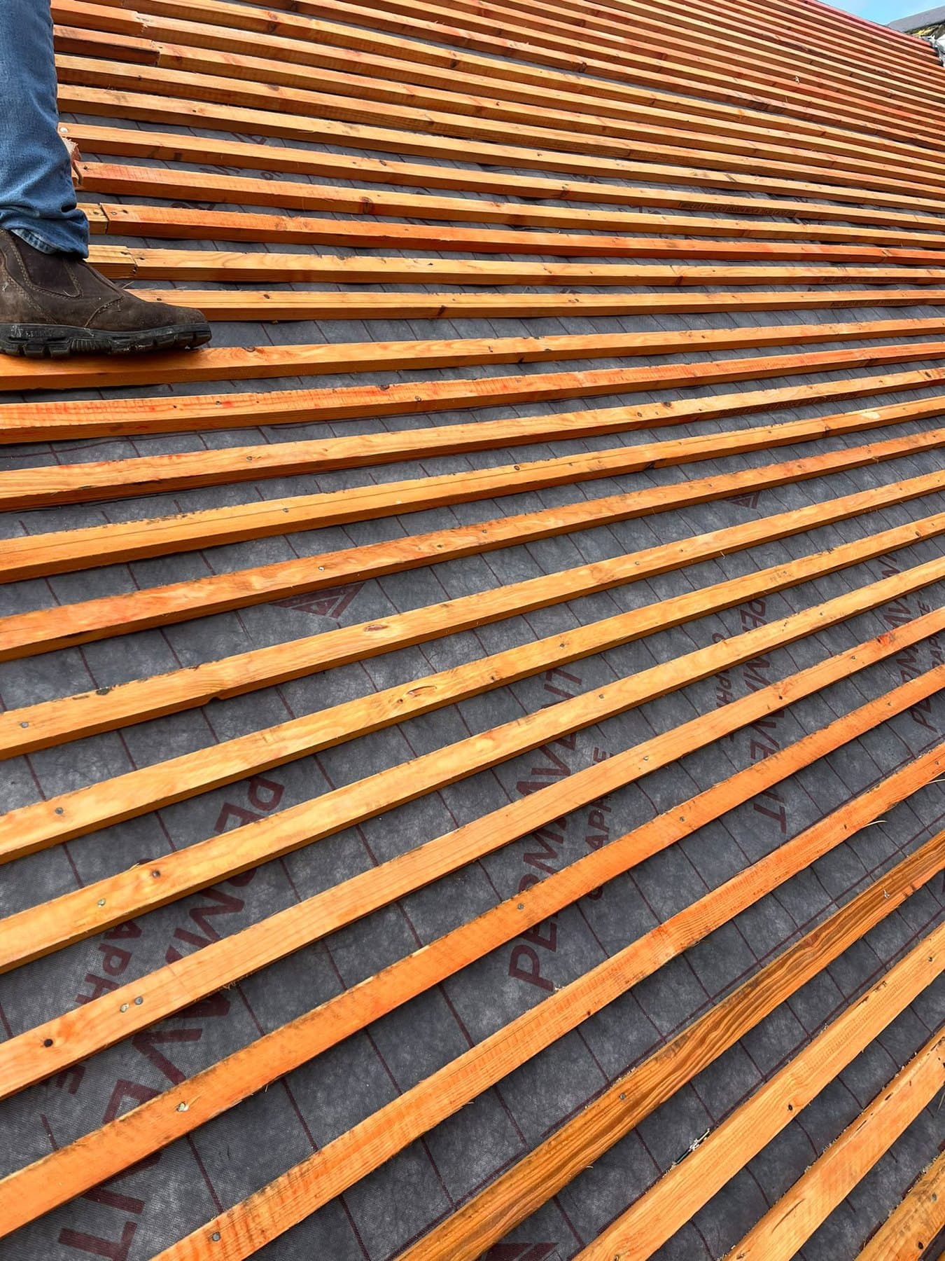 Fresh treated battens ready for tiling