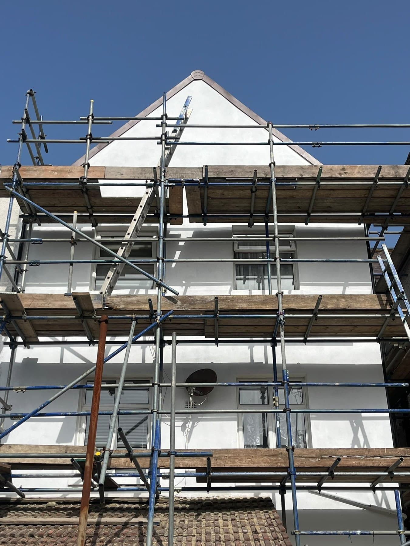 Scaffold up against a rendered gable end